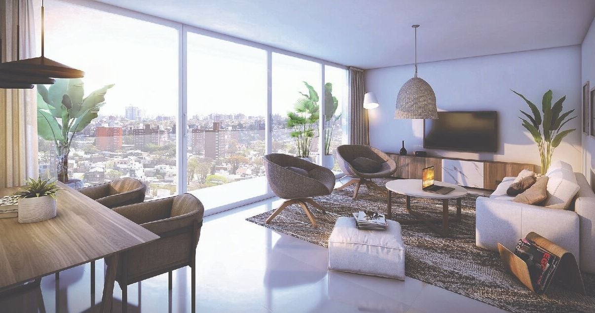 Interior de un apartamento del edificio Bartolito con sillones y decoración beige del estudio de arquitectos Paggi y Zinno