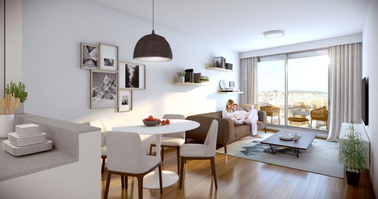 Living comedor de un apartamento moderno en la Torre Centra del Compass desarrollo inmobiliario